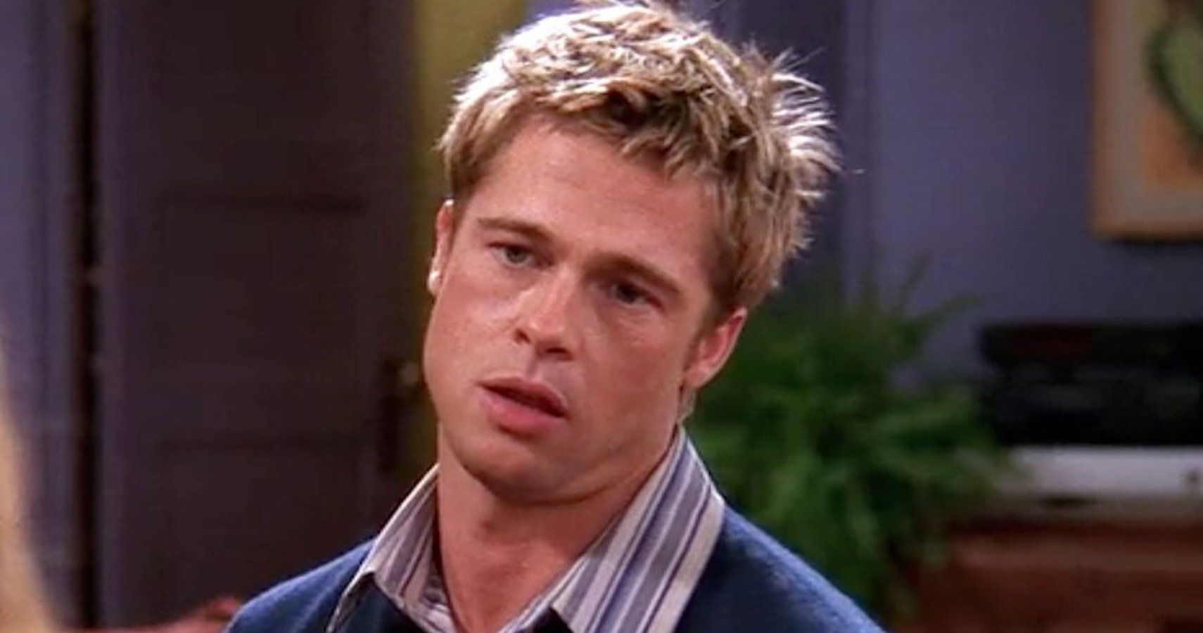 Brad Pitt looks at Rachel with a gormless expression in Friends