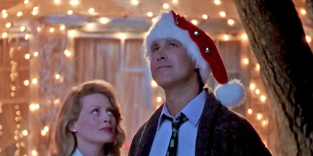Clark and his wife in front of their lights in Christmas Vacation