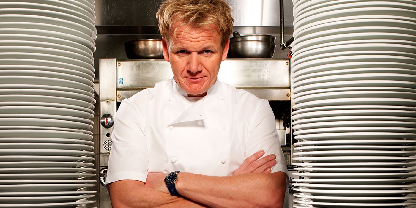 Gordon Ramsey in the kitchen with his arms crossed