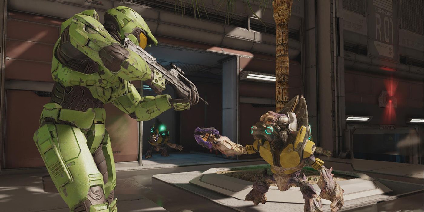 A soldier pointing their gun at a robot in Halo 2