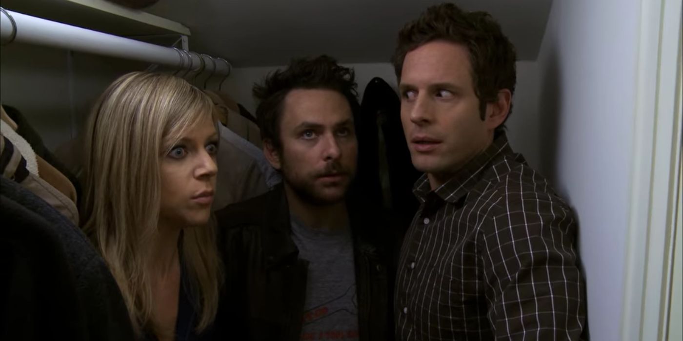 Dee, Charlie and Dennis hiding in a closet