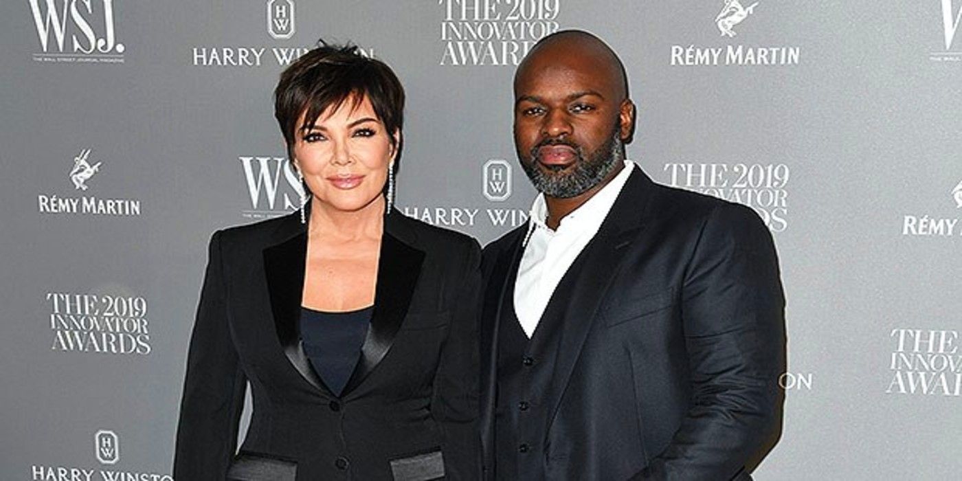 Kris Jenner and Corey Gamble at an awards ceremony.