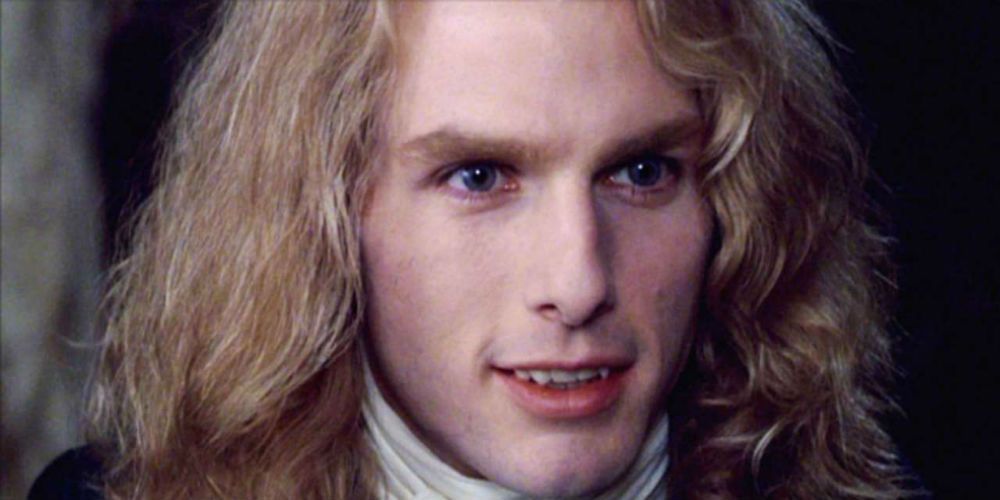 Lestat smiling like a predator in Interview with the Vampire