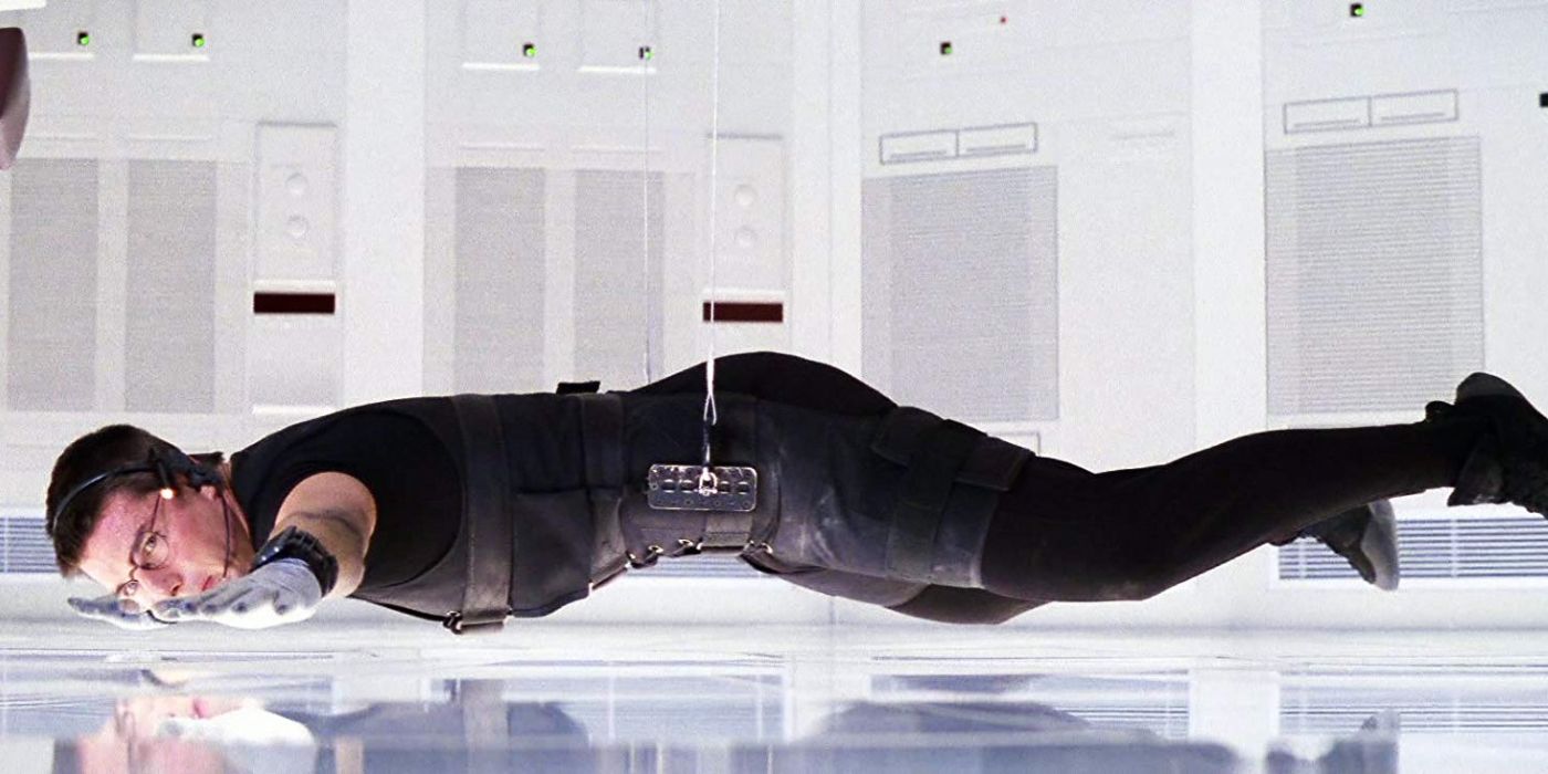 Tom Cruise in the Langley heist in Mission Impossible