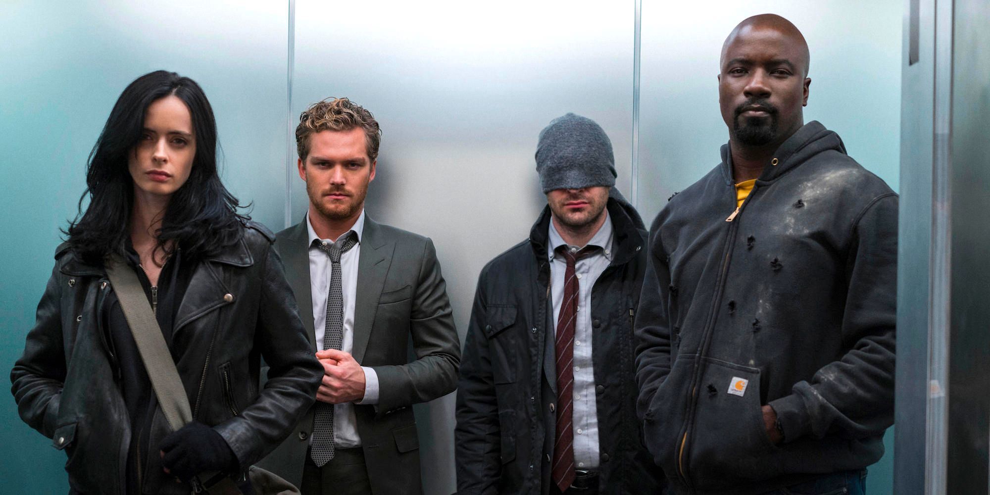 The Defenders waiting in an elevator