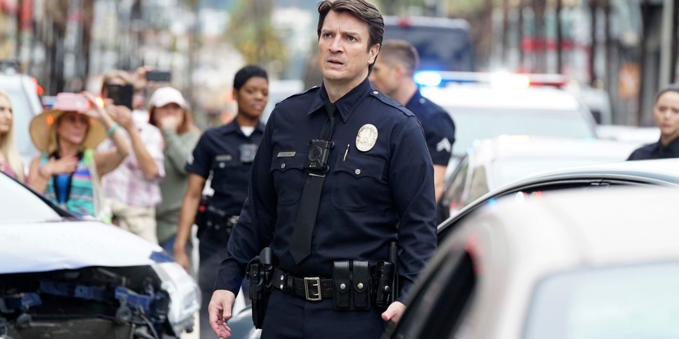 Nolan standing beside a car in The Rookie