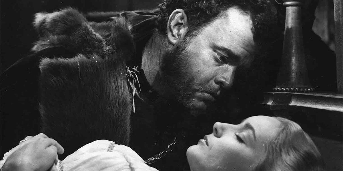 Orson Welles as Othello looking upset