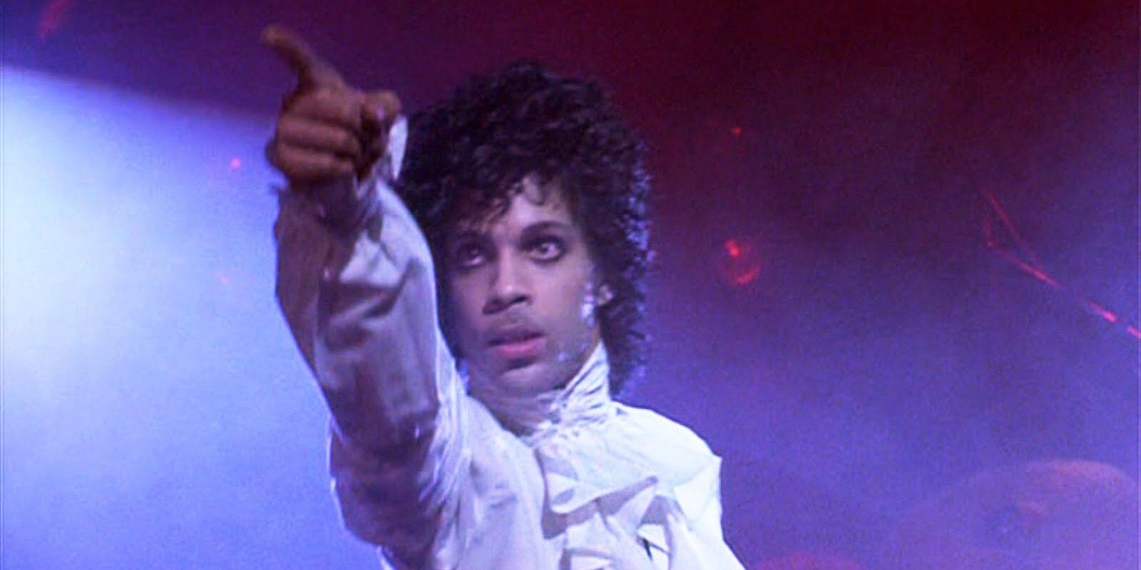 Prince pointing at someone in Purple Rain