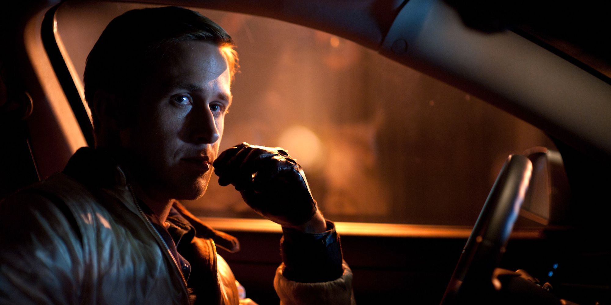 Ryan Gosling waiting in a car in Drive