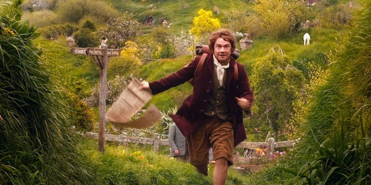 Bilbo runs through a field in The Hobbit