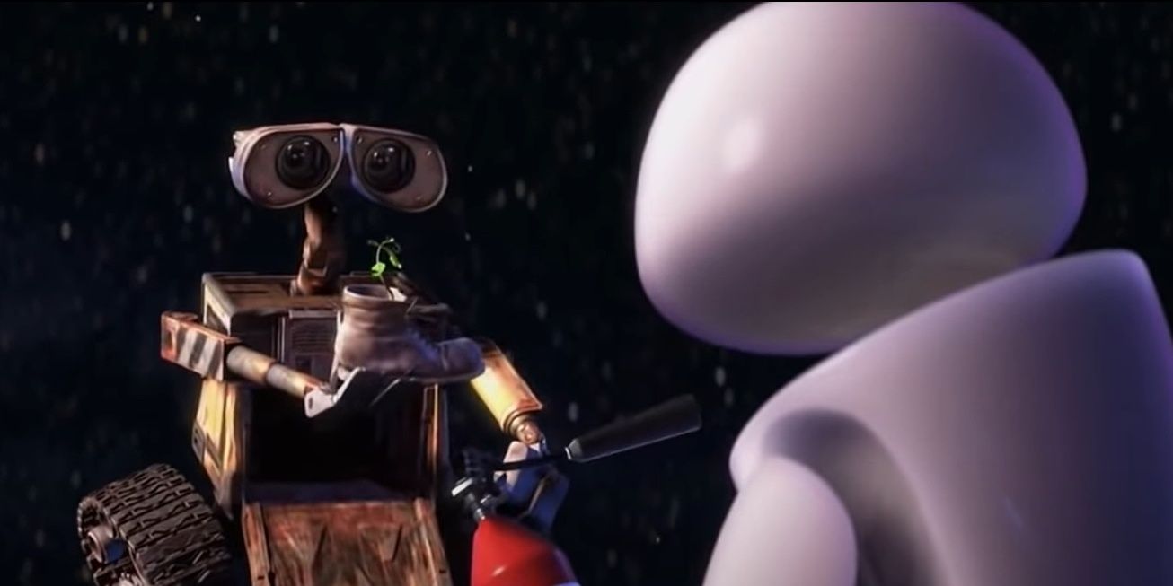 Wall-E holds out a plant to Eve in Pixar's Wall-E
