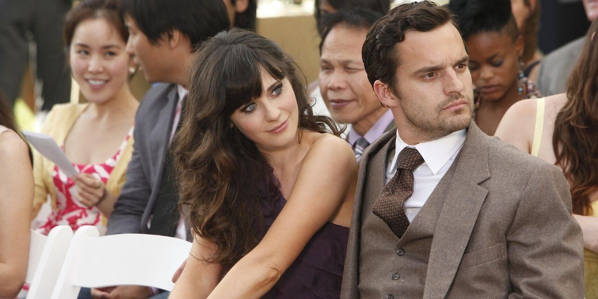 Jess e Nick sentam juntos no episódio New Girl 