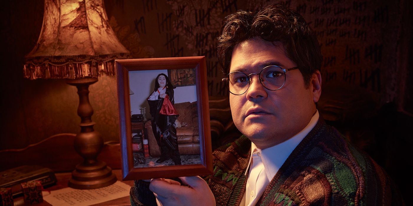 Guillermo showing a portrait in What We Do In The Shadows.