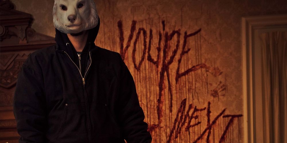 A killer wearing an animal mask in You're Next