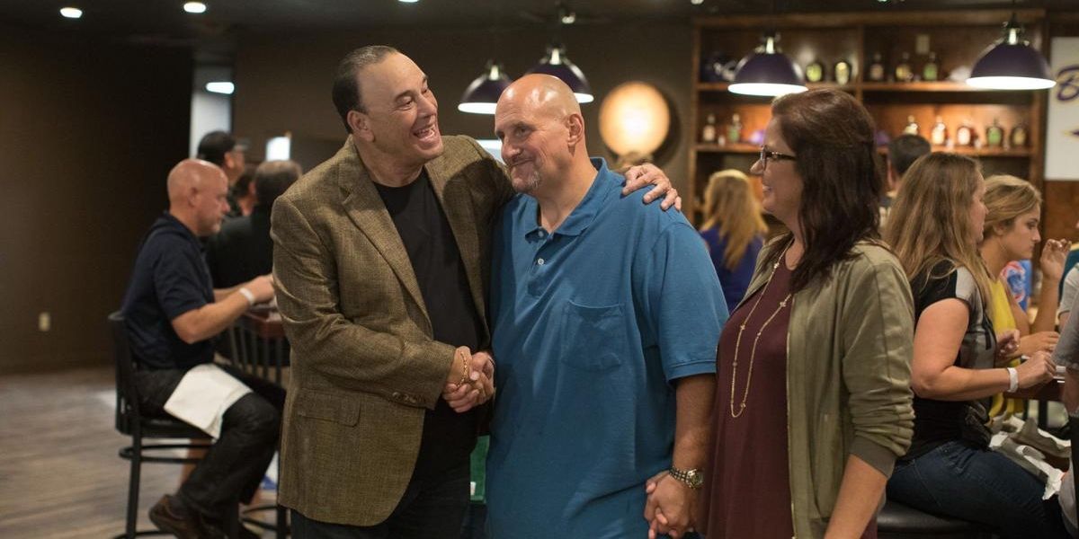 Jon Taffer shakes a man's hand