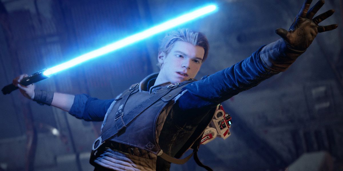 Cal Kestis wielding a blue lightsaber and using the Force in Star Wars: Jedi Fallen Order