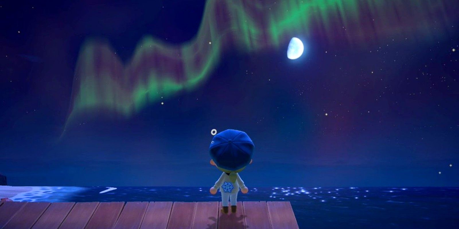 A player watches an aurora over the pier during winter in Animal Crossing: New Horizons