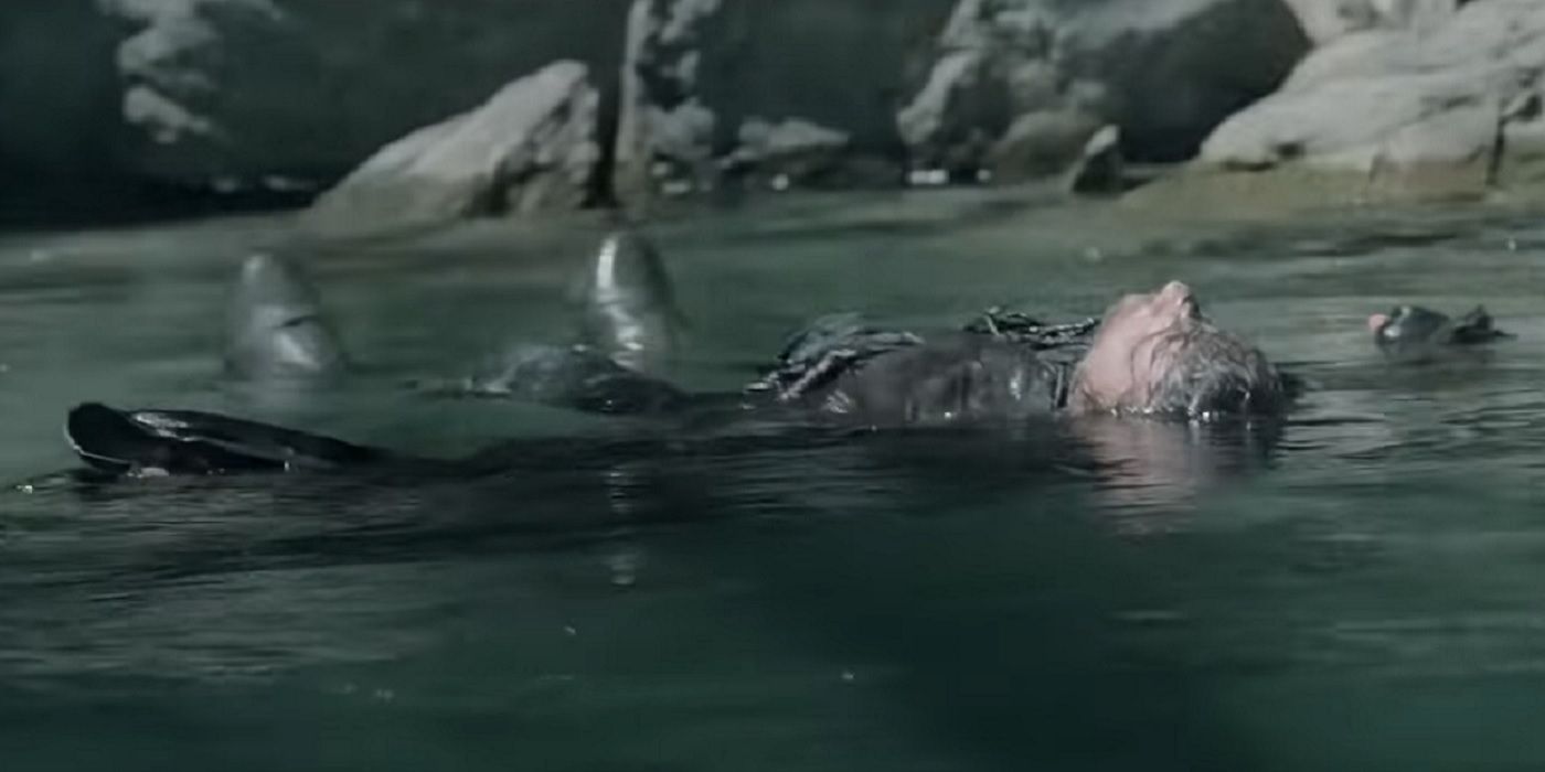 An image of Aragorn floating in the water in The Lord Of The Rings: Two Towers