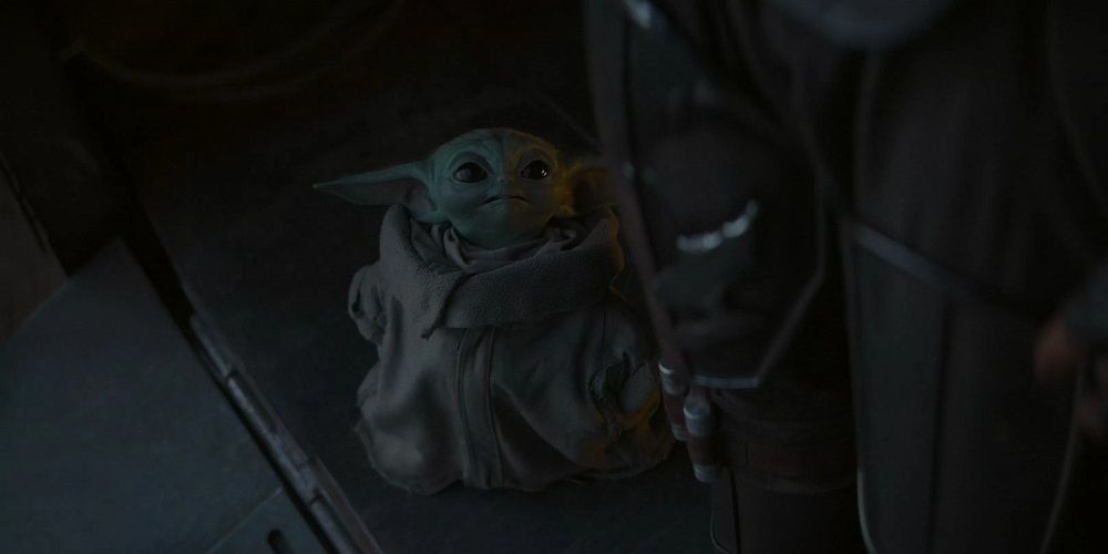 Baby Yoda looks up in The Mandalorian