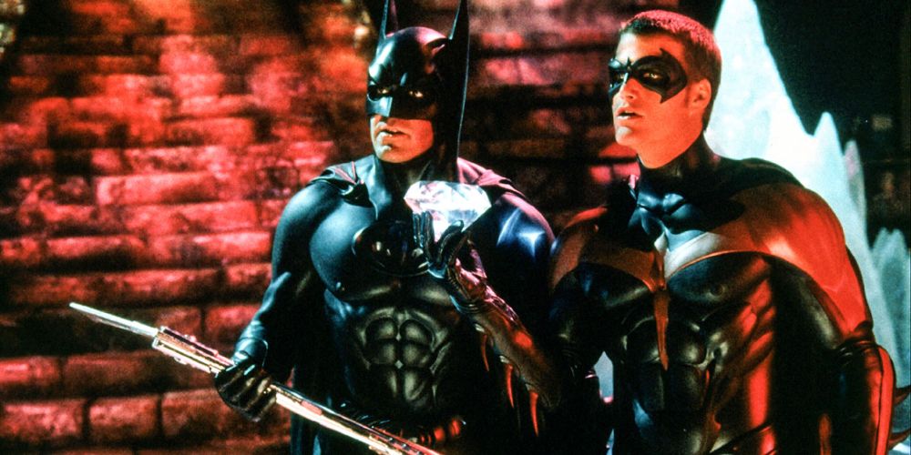Batman and Robin stand together 