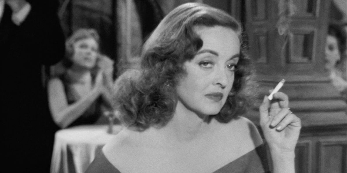 Bette Davis smoking a cigarette in All About Eve