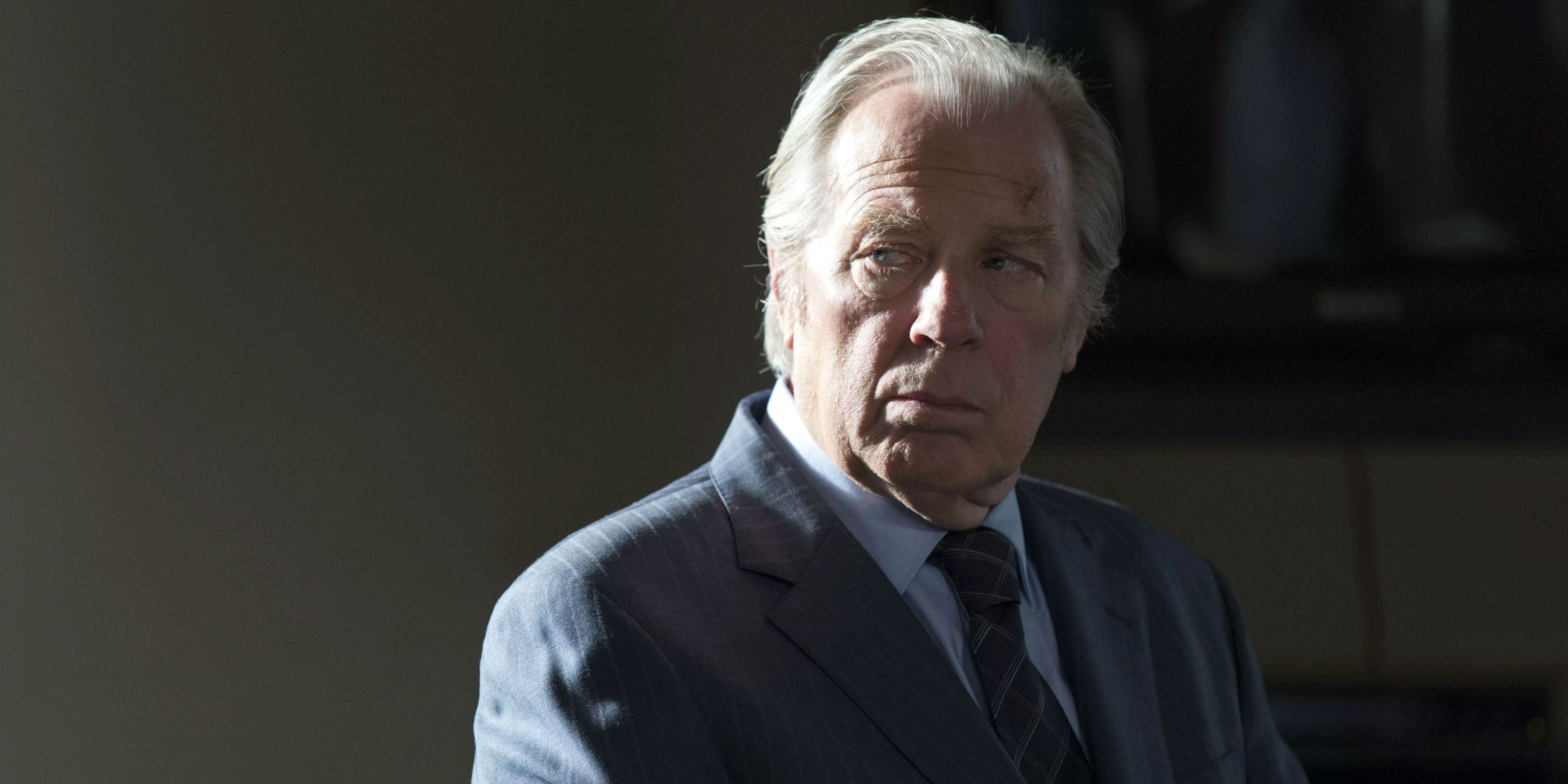 Chuck McGill in suit looking suspicious in Better Call Saul