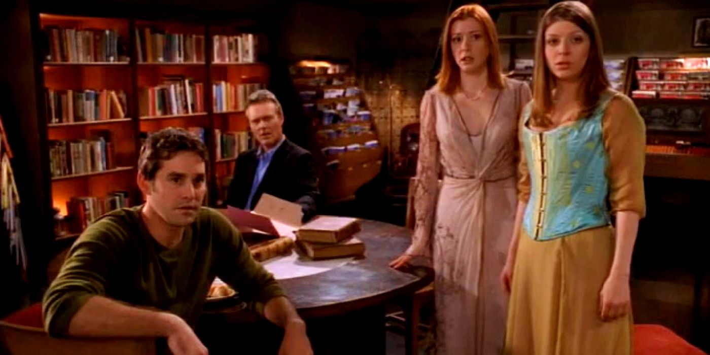 Xander, Giles, Willow, and Tara in the library in Buffy The Vampire Slayer