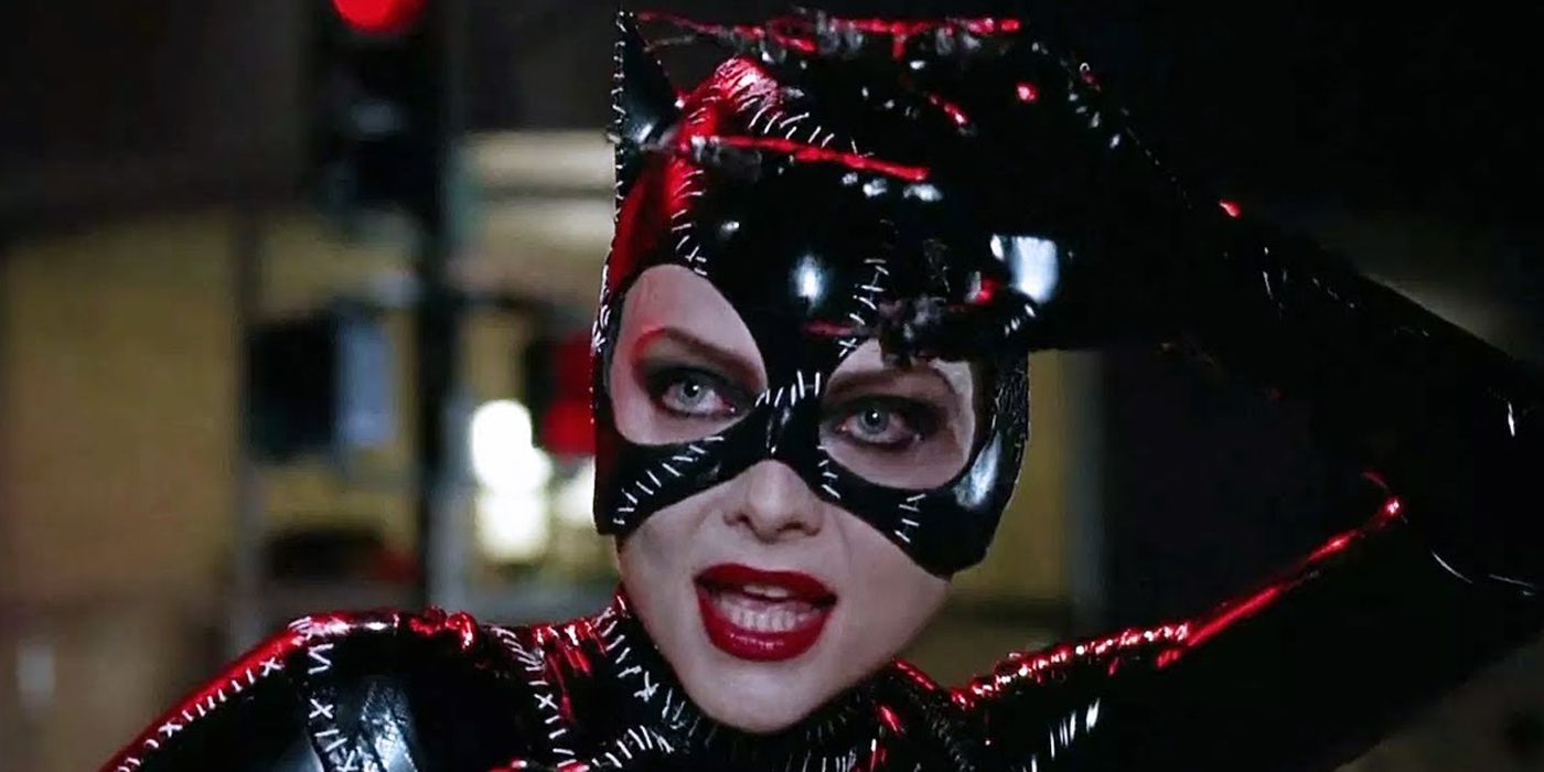 Catwoman makes a claw with her hand in Batman Returns.