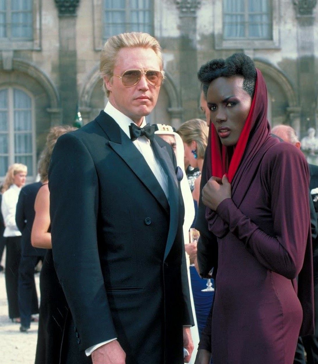 Christopher Walken as Max Zorin and Grace Jones as May Day in James Bond View To a Kill vertical