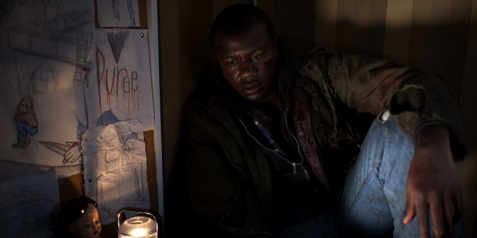 Dante Bishop sitting in The Purge