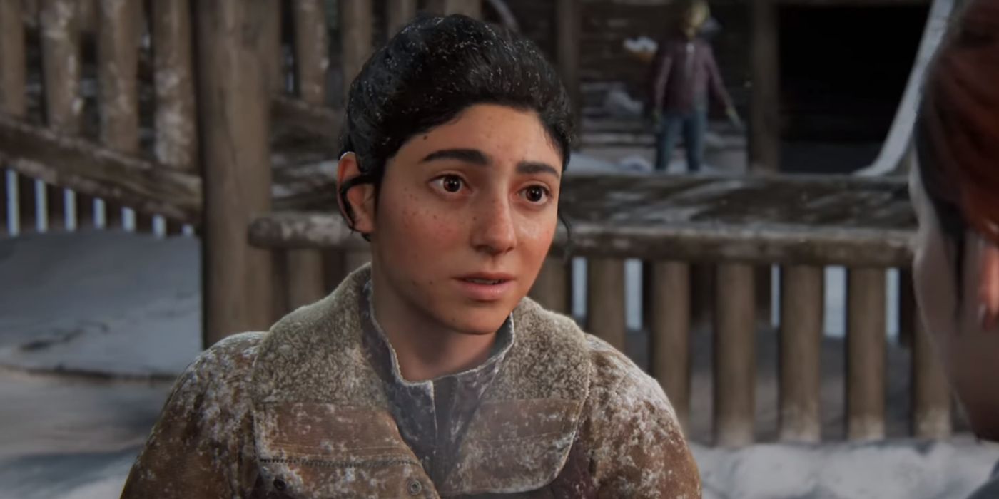 Dina in The Last of Us 2 looking off camera