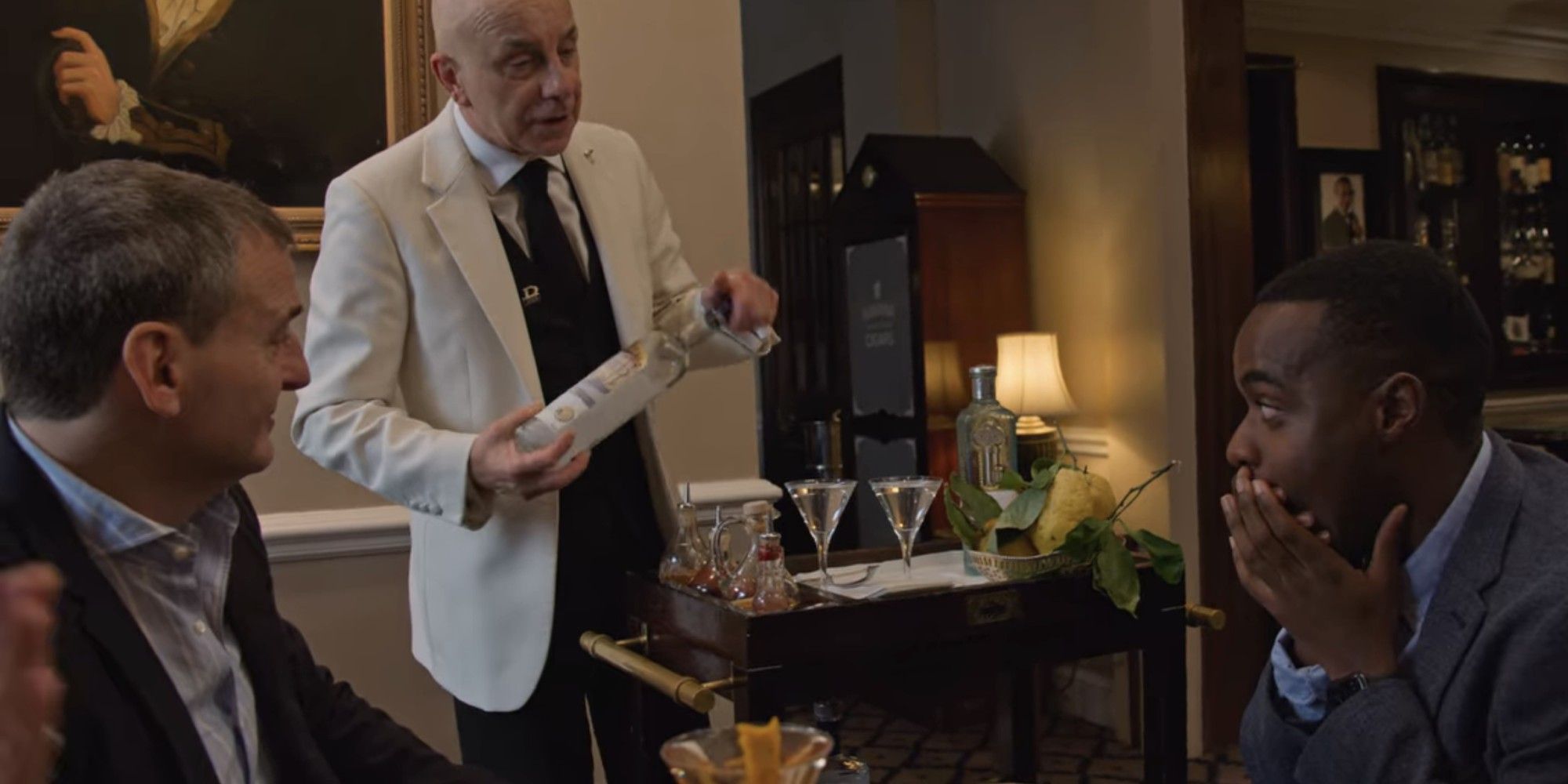 Table being presented with wine at Dukes London in Somebody Feed Phil season 3 episode 3