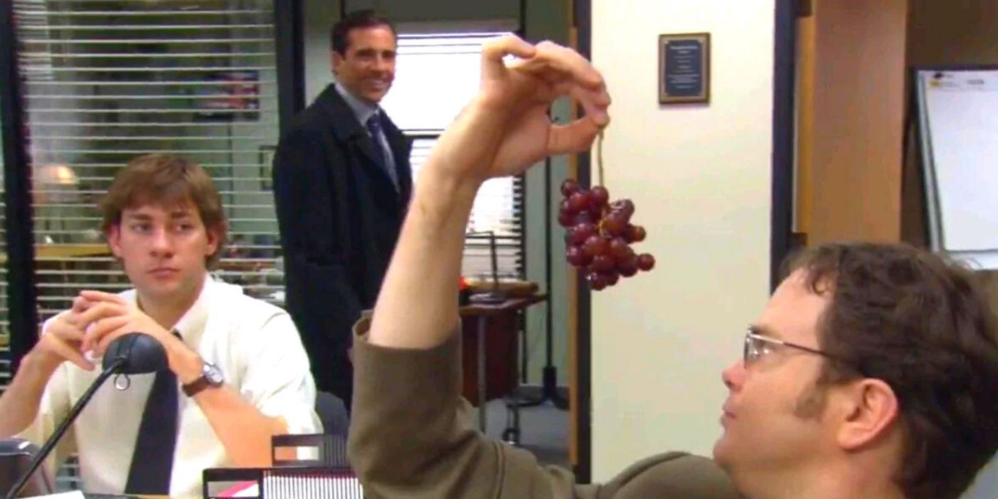Dwight eats grapes in front of Jim and Michael on The Office