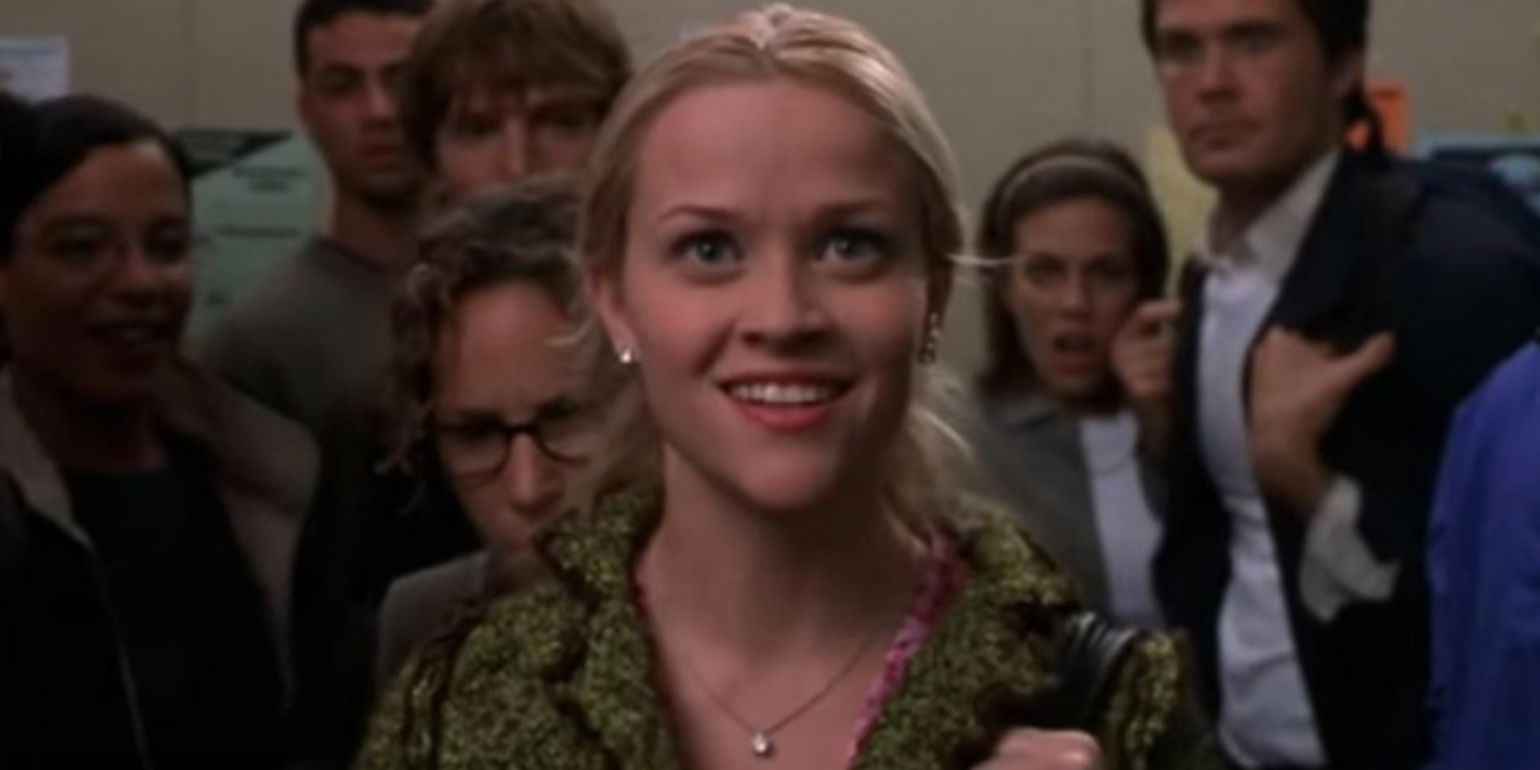 Elle Woods stands in a group of law students as she sees her nam on the internship list in Legally Blonde
