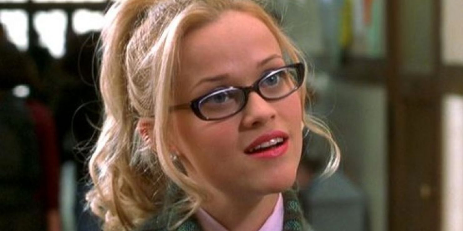 Elle Woods tilts her head to the side as Warner asks her about Harvard in Legally Blonde