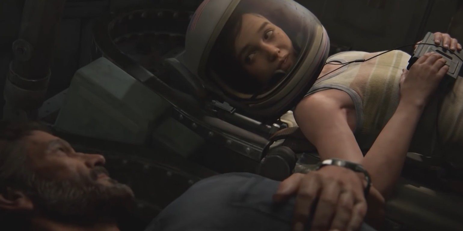 Ellie wears an astronaut's headgear as she smiles at Joel in The Last of Us Part II.