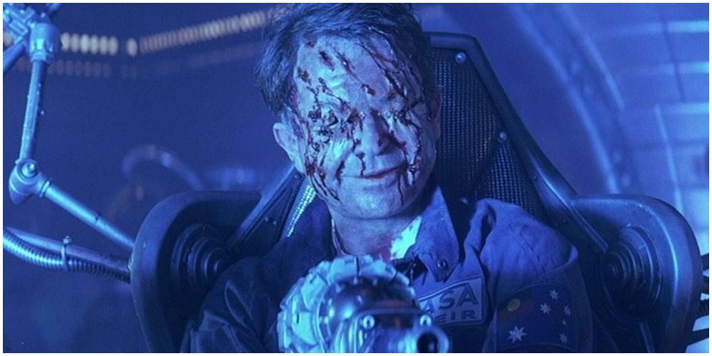 Sam Neill as Doctor Weir at the end of Event Horizon covered in scars