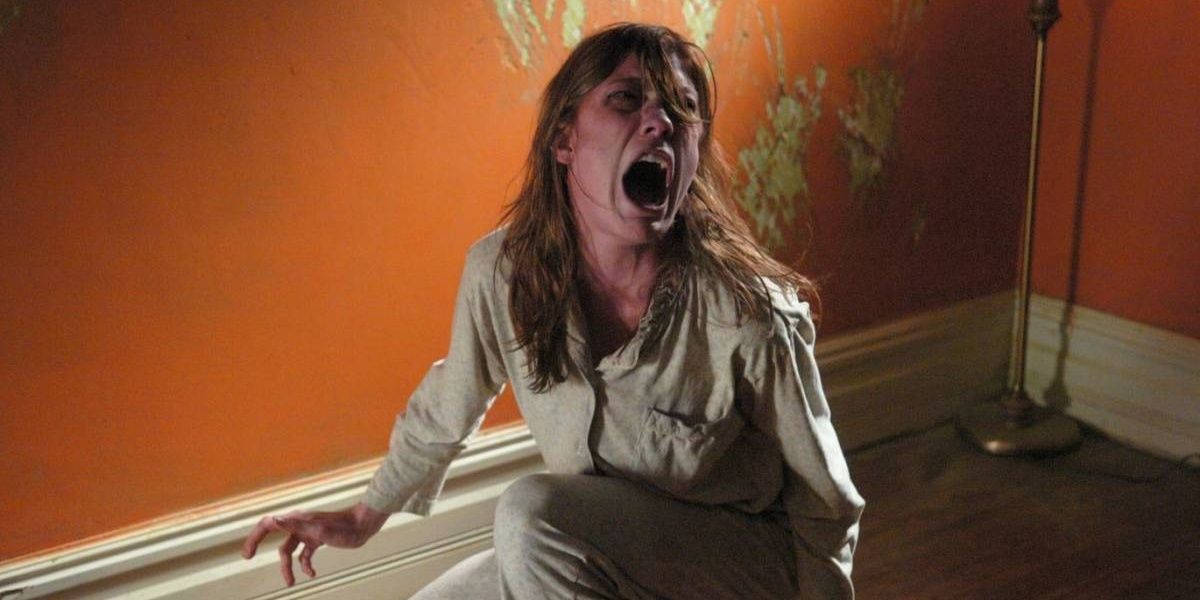 Emily screaming in a white robe in The Exorcism Of Emily Rose.
