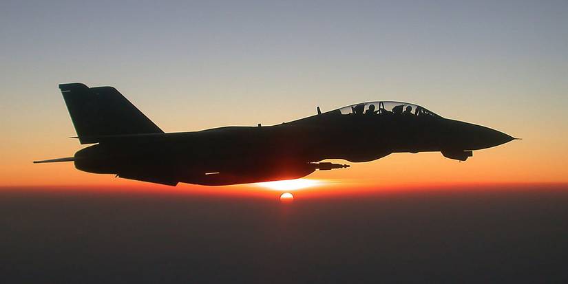 F-14-Tomcat-from-Top-Gun flying at sunset