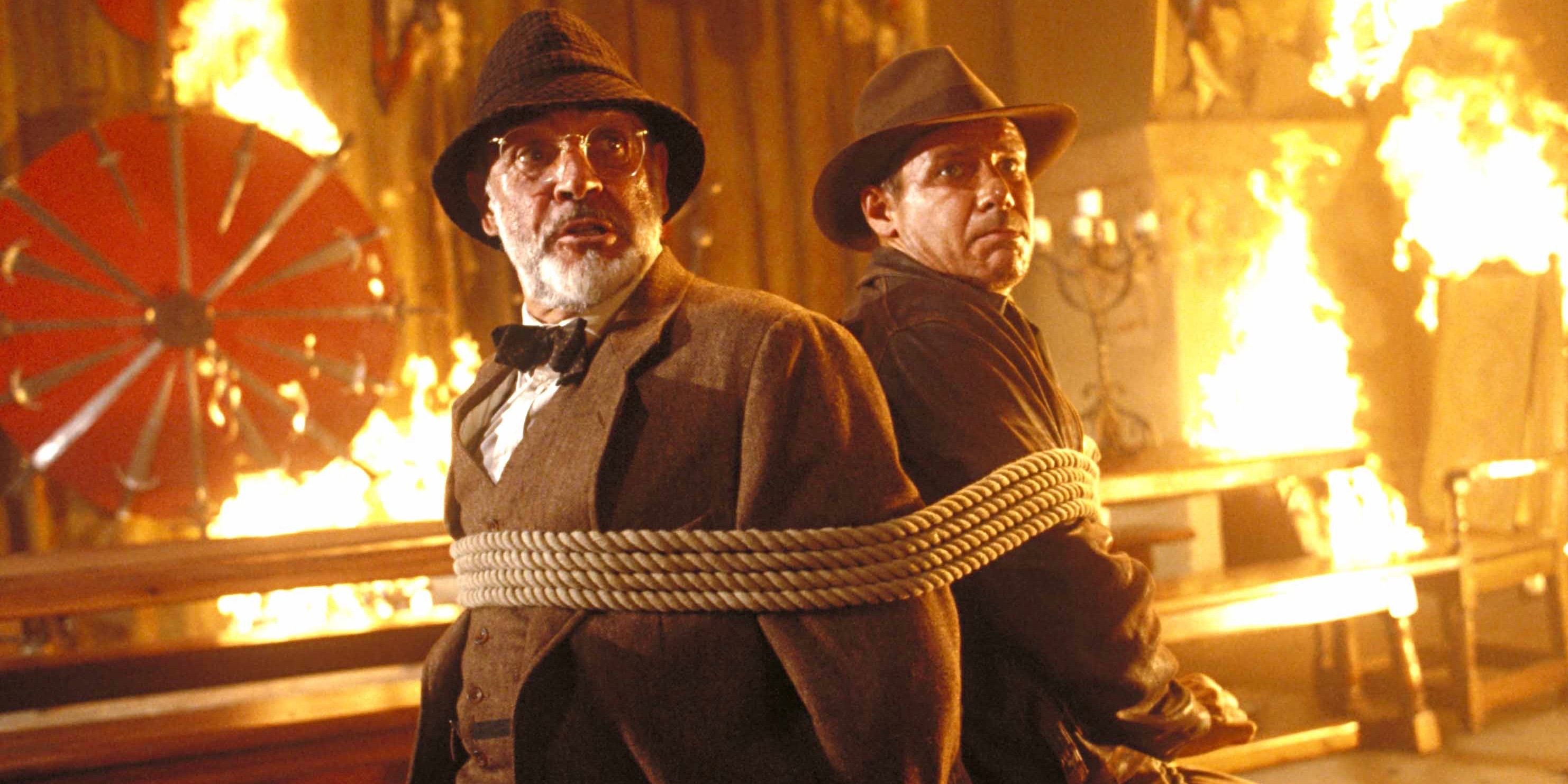 Henry and Indiana Jones tied to a chair in Indiana Jones and the Last Crusade
