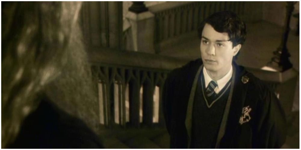 Dumbledore looking down at young Tom Riddle in Harry Potter