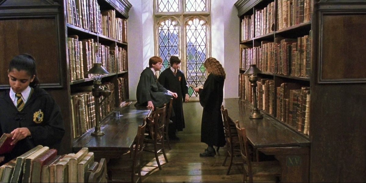 Harry, Ron, and Hermione in the library 