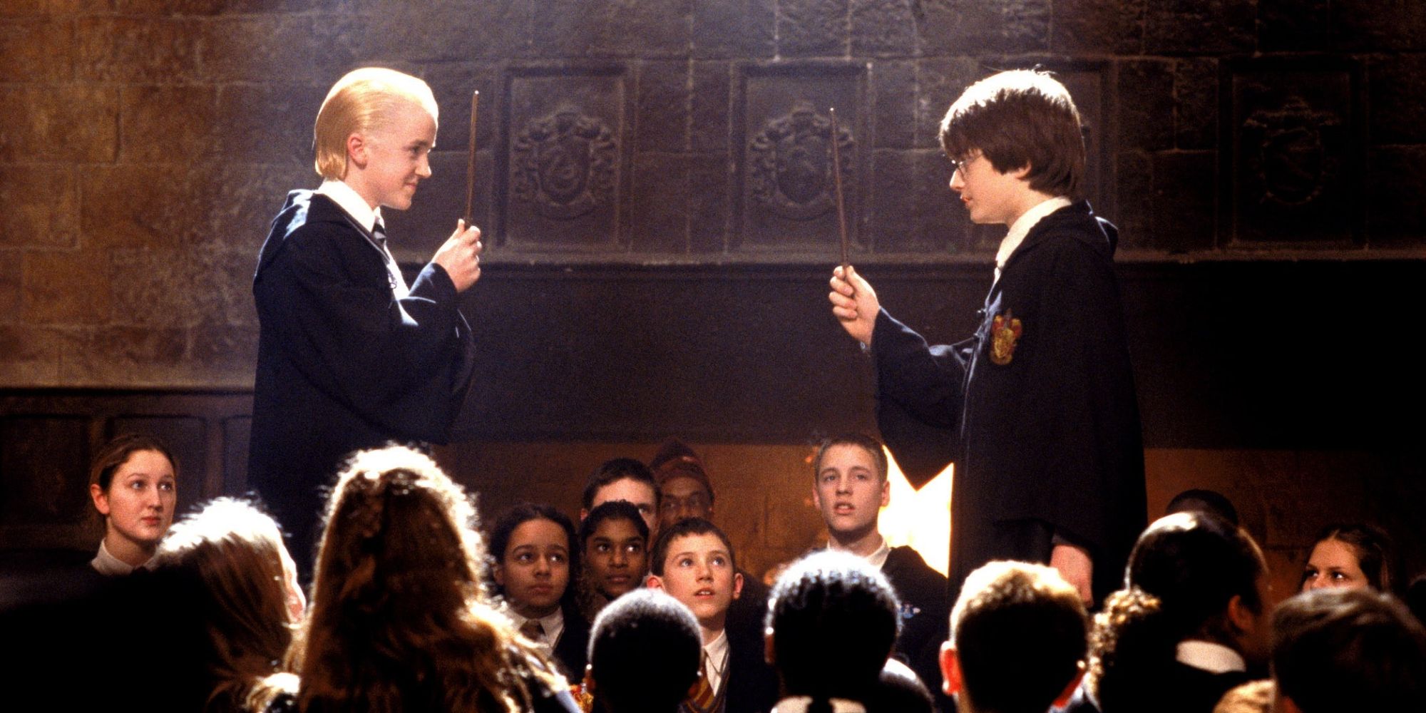 Harry e Draco duelando em Harry Potter e a Câmara Secreta.