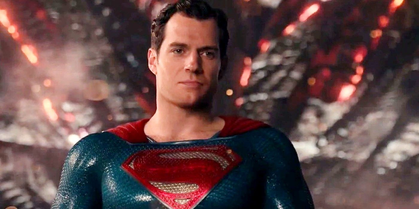 Superman stands in front of destruction in The Justice League