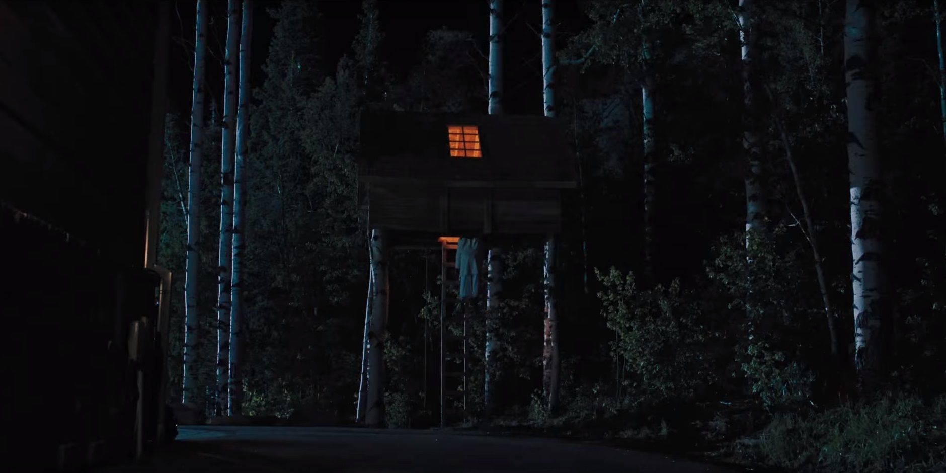 A glowing light in the treehouse in Hereditary