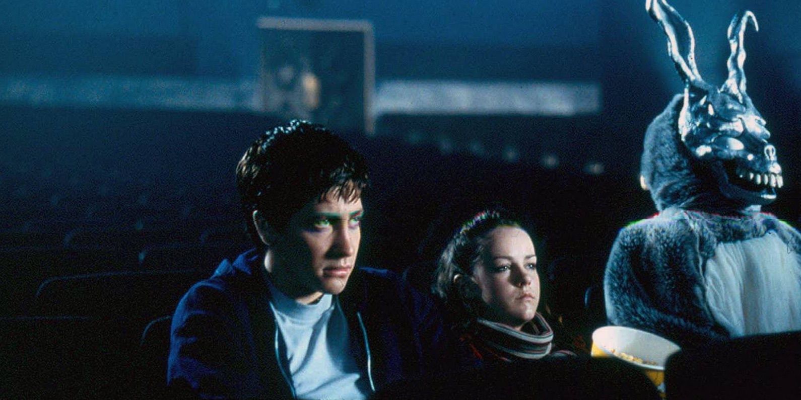 Jake Gyllenhaal and Jena Malone in Donnie Darko in a movie theater