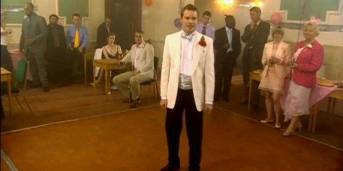 Jeremy stands on his own at his wedding in Peep Show