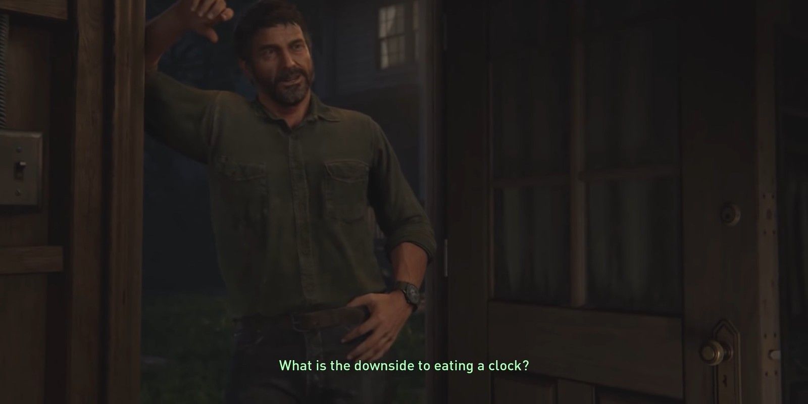 Joel leans on a door and smiles in The Last of Us Part II.