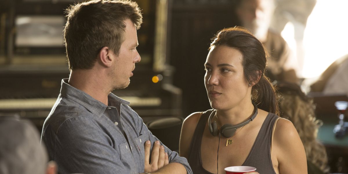 An image of Jonathan Nolan and Lisa Joy talking to each other