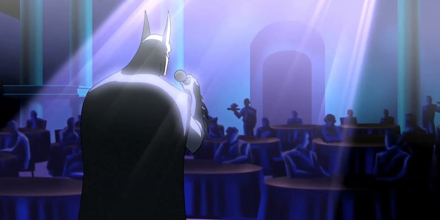 Batman speaking to a room of people in Justice League Unlimited.